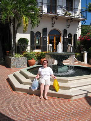 Taking a rest by the fountain from shopping